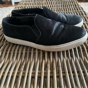 Trendy Cole Haan Black Fur and
Leather Slip on Sneakers. Great condition.